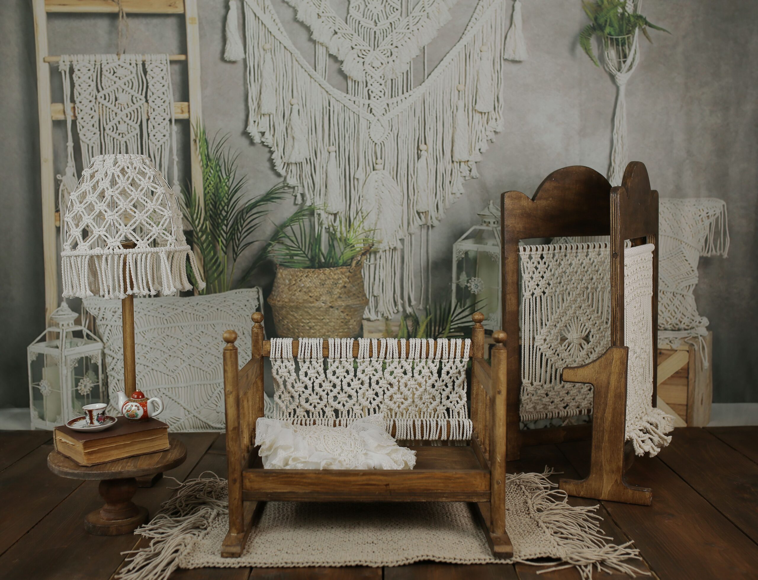Collected boho living room with cream sofa, leather chair, patterned rug and styled wooden coffee table