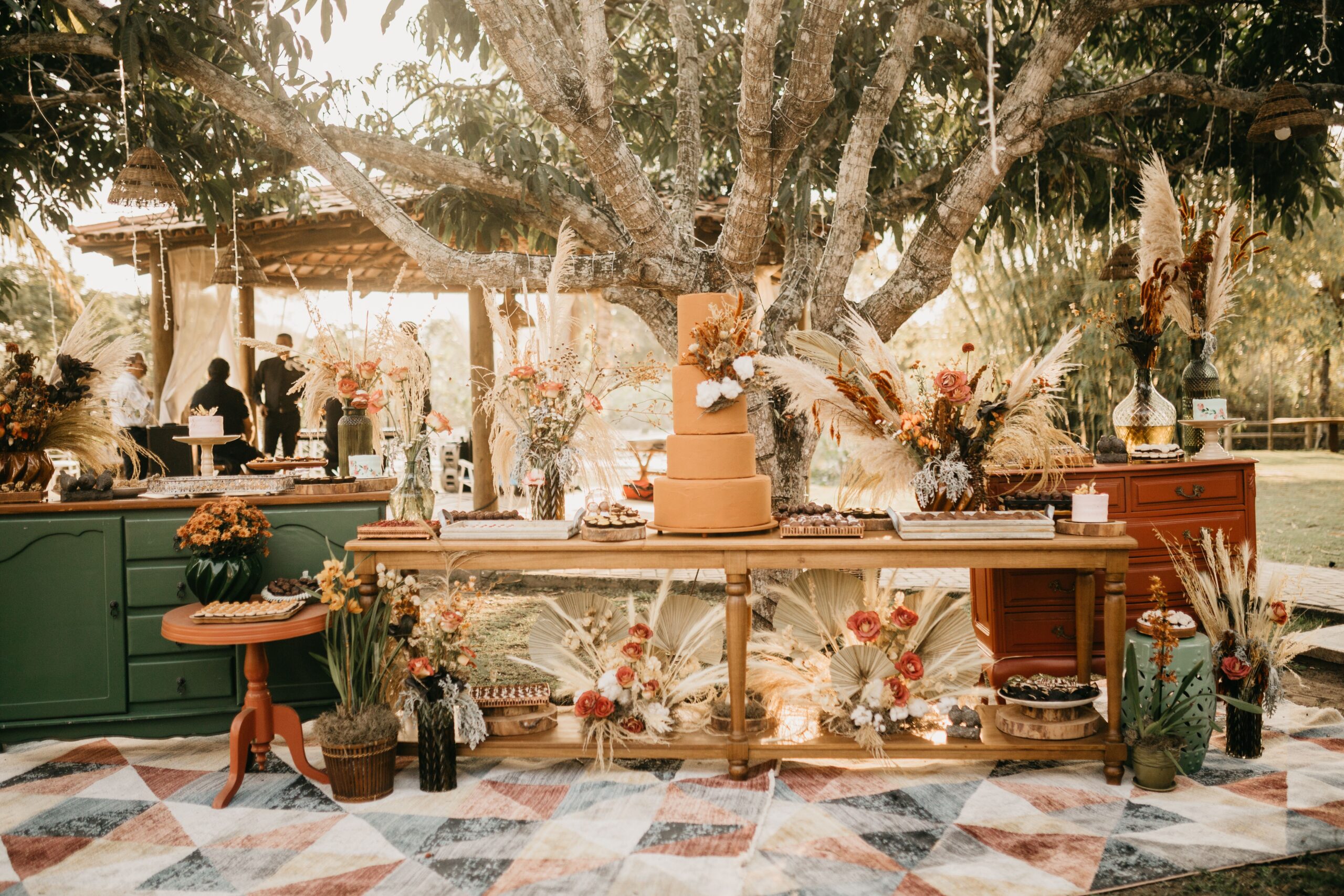 Boho seating corner displaying jute, linen, knitted, leather, woven and wood textures
